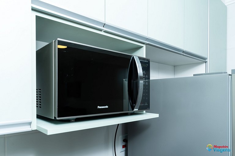 Apartamento incrível a apenas 50 metros da praia, com ar-con