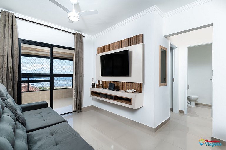 Apartamento incrível a apenas 50 metros da praia, com ar-con