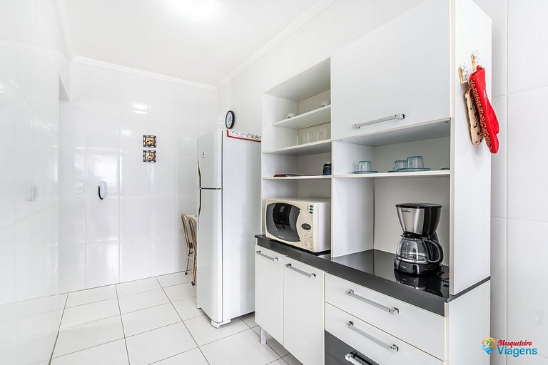 Apartamento confortável a apenas 100 metros da praia no bair